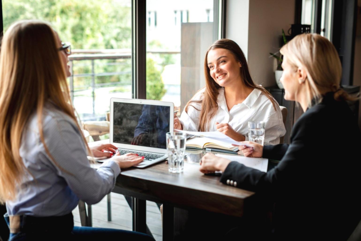 Professional examining advanced financial instruments and risk assessment tools